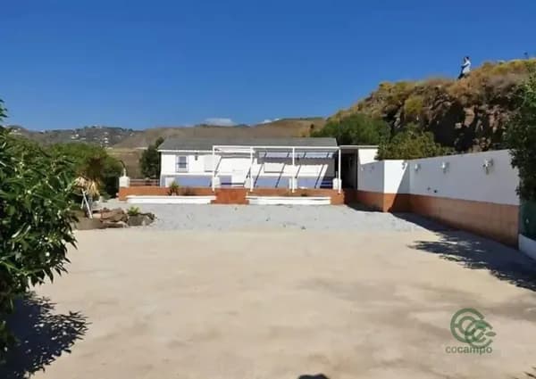 Finca agrícola de 0,25 ha en venta en Torrox, Malaga