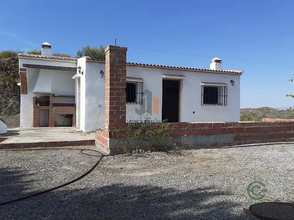Finca agrícola de 0,6 ha en venta en Árchez, Málaga
