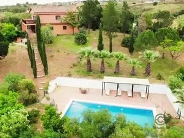 Finca rústica de 0,6 ha en venta en Mijas, Malaga
